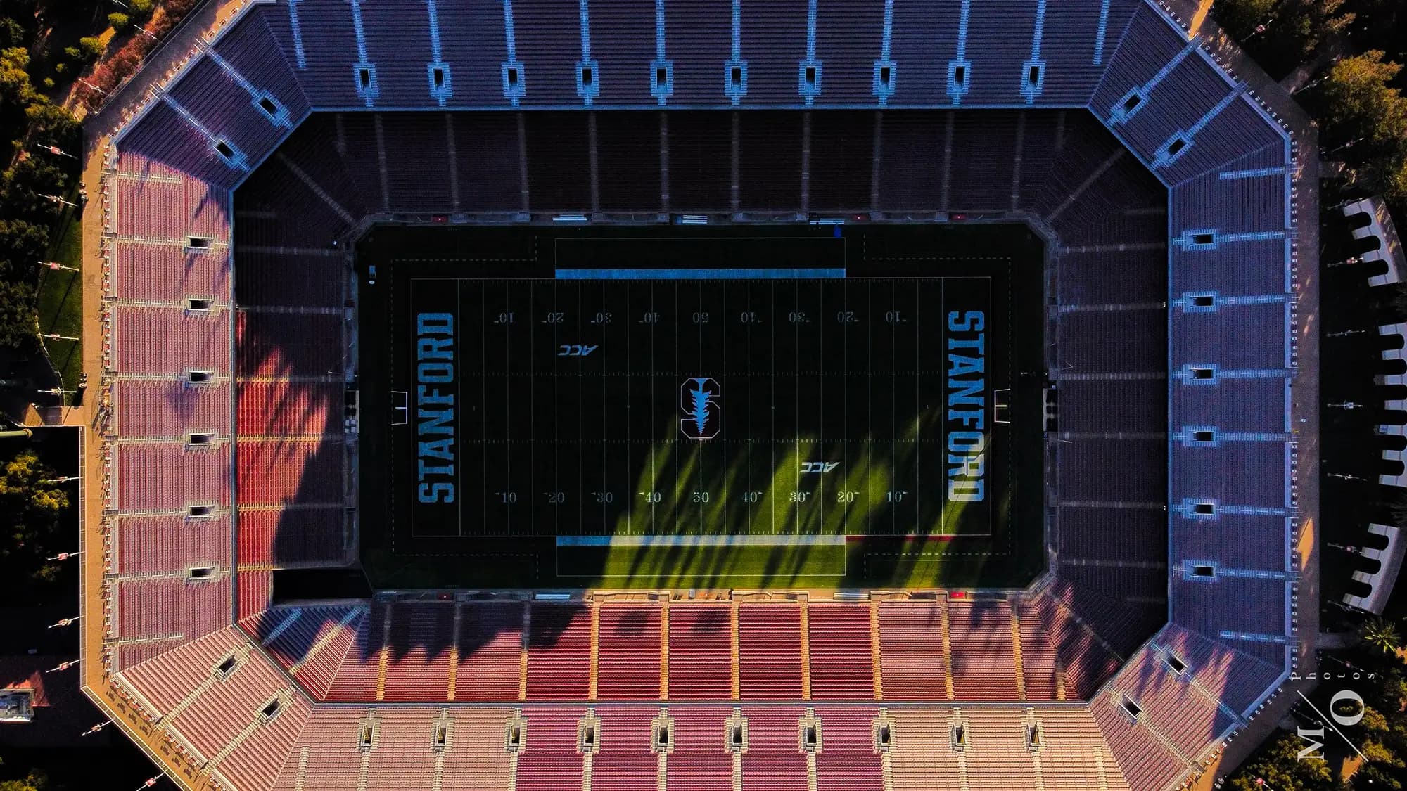 Aerial landscape of a stadium with the surrounding cityscape in context